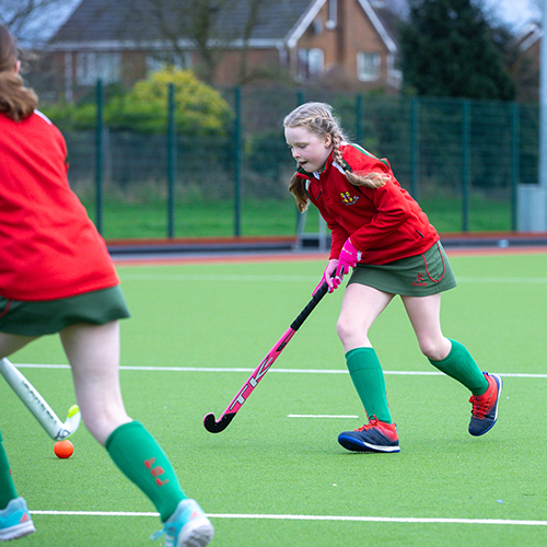 Students playing hockey