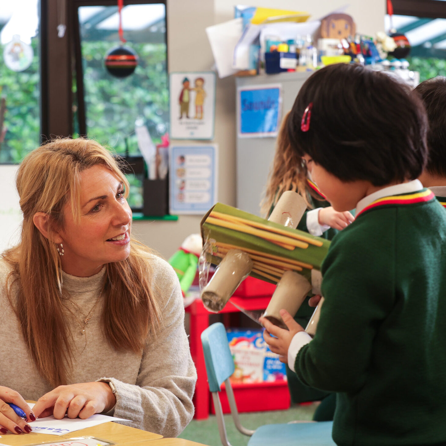 Teacher talking to a student