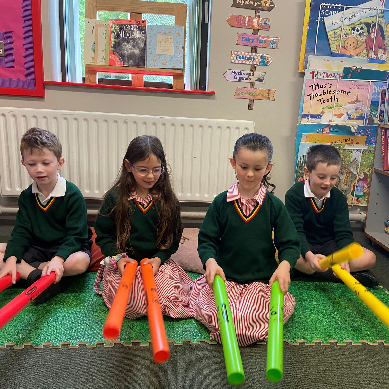 Students with coloured tubes