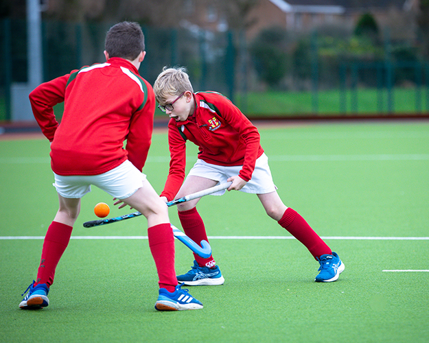 Students playing hockey